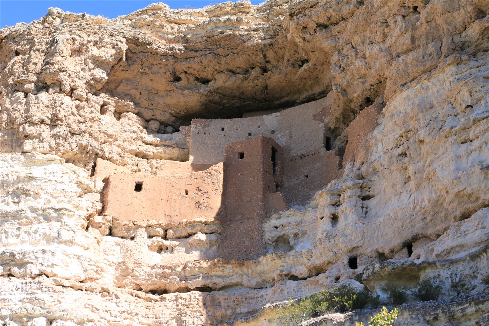 Montezuma Castle, a five-story Sinagua cliff dwelling built into a limestone alcove above Beaver Creek, Arizona