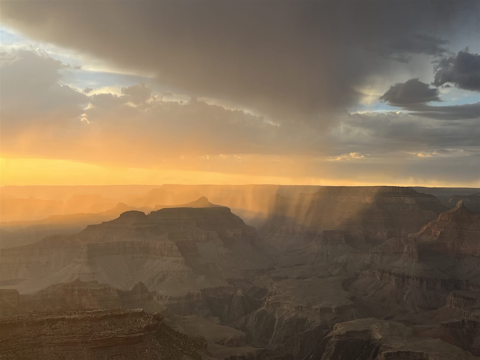 A monsoon storm at sunset over the Grand Canyon South Rim